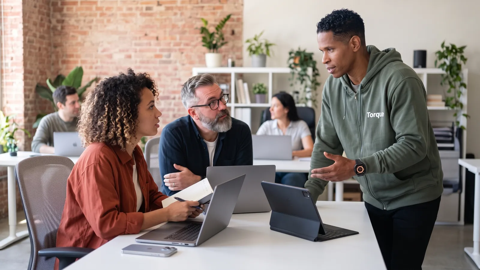 Torque's founder leading a workshop with a leadership team (AI-generated)